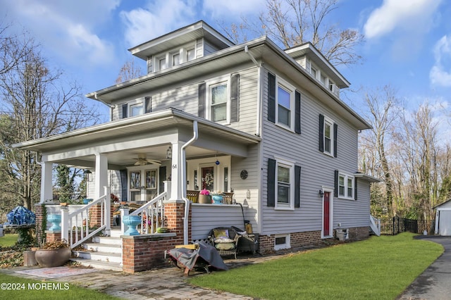 view of front of house featuring a porch and a front lawn