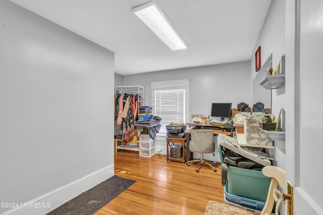 office area with hardwood / wood-style flooring