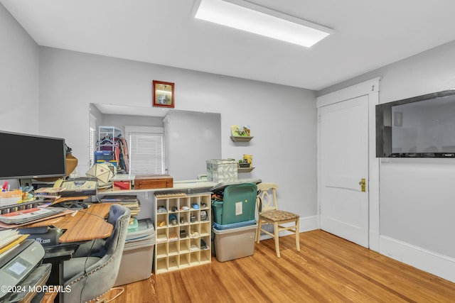 office space with light hardwood / wood-style floors