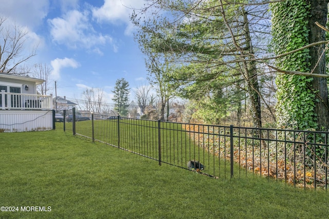 view of yard featuring a deck