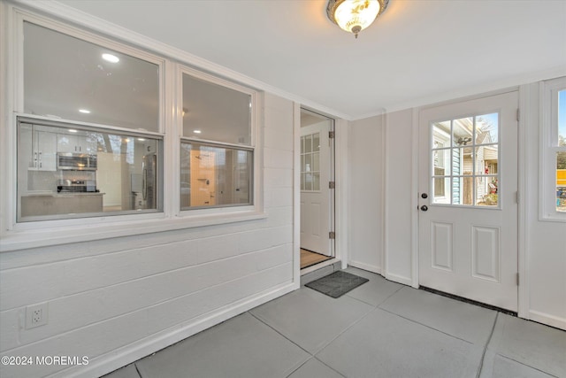 interior space featuring light tile patterned flooring