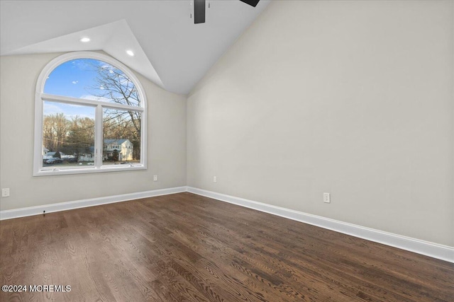 interior space with dark hardwood / wood-style floors, ceiling fan, and lofted ceiling