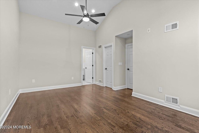 unfurnished room featuring ceiling fan, dark hardwood / wood-style flooring, and high vaulted ceiling