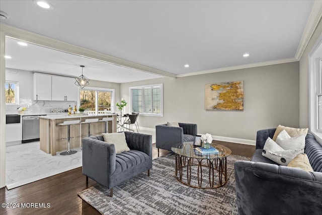 living room with light hardwood / wood-style floors and ornamental molding