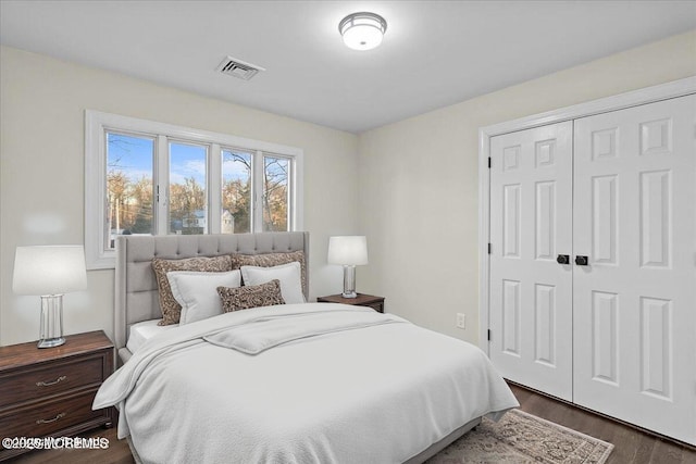 8 Chesapeake Rd, Manalapan, NJ 07726 - bedroom with a closet and dark wood-style floors