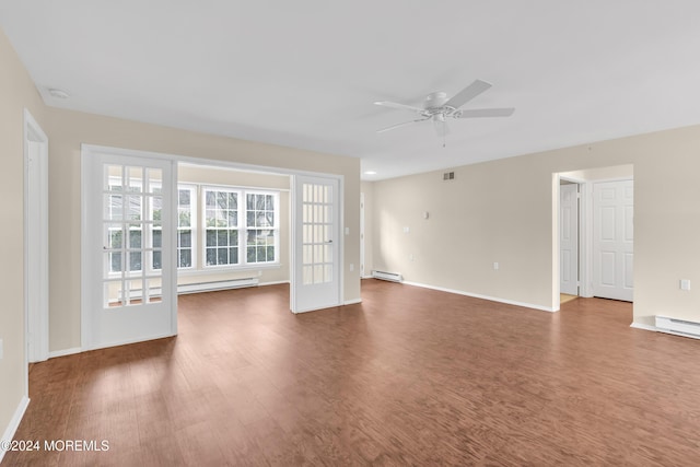 spare room with ceiling fan, french doors, dark wood-type flooring, and a baseboard radiator