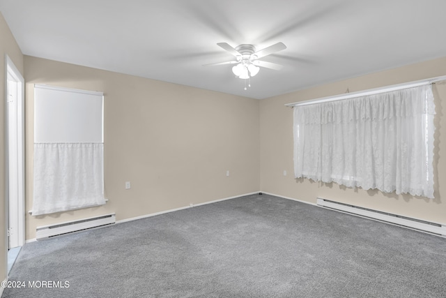 spare room with baseboard heating, ceiling fan, and carpet flooring