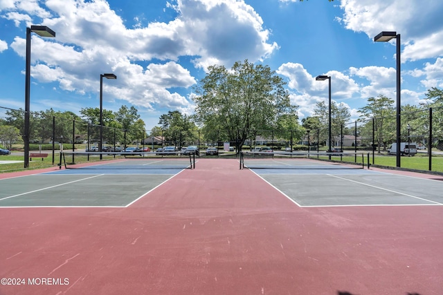 view of tennis court with basketball court