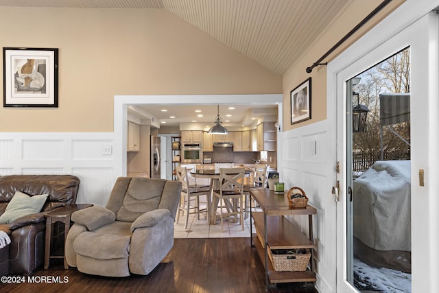 living room featuring hardwood / wood-style floors, wood ceiling, and vaulted ceiling