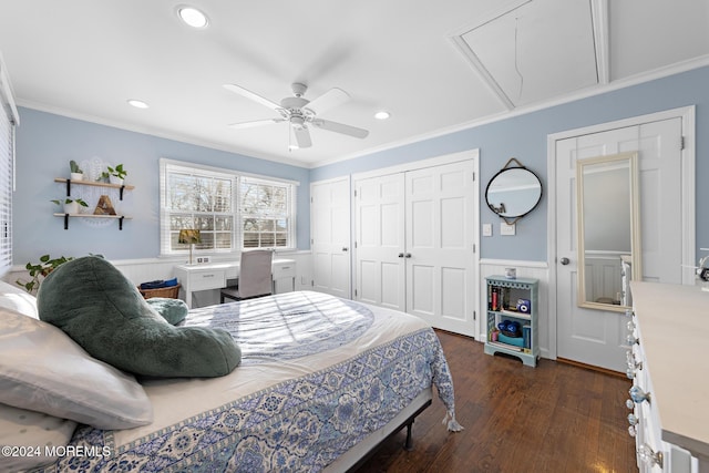 bedroom featuring ceiling fan, dark hardwood / wood-style floors, crown molding, and a closet