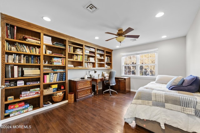 bedroom featuring dark hardwood / wood-style floors and ceiling fan