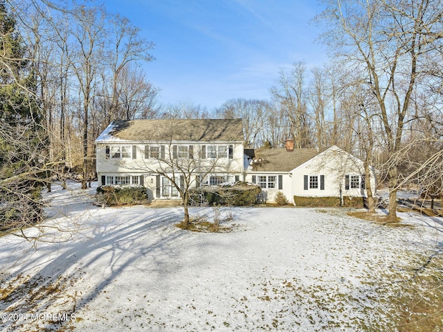 view of snow covered property