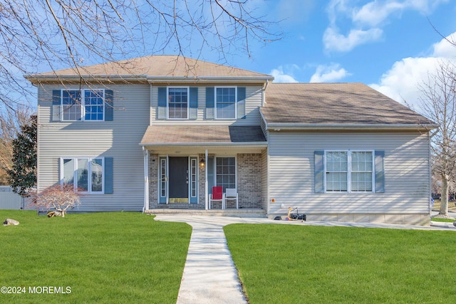 view of front of house with a front lawn