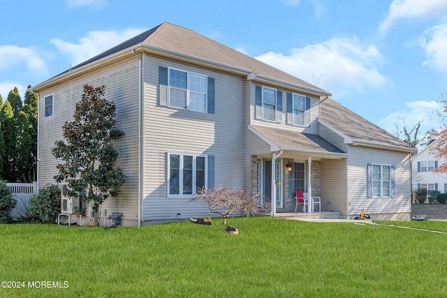 view of front of home with a front yard