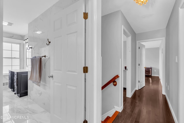 hallway featuring hardwood / wood-style floors