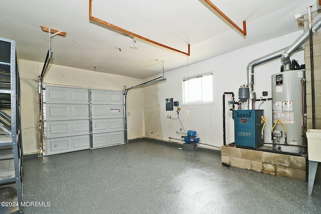 garage featuring electric panel and gas water heater