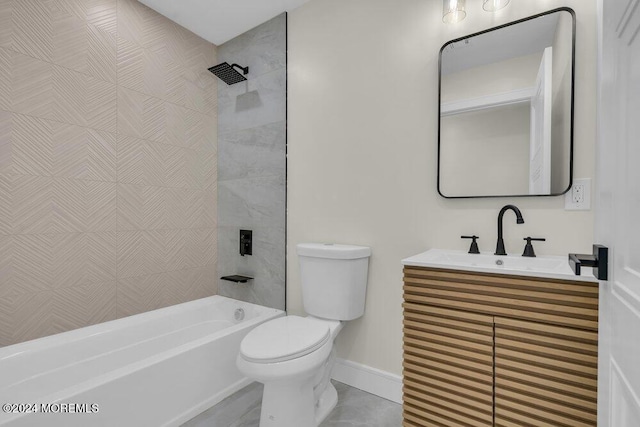 full bathroom featuring tiled shower / bath combo, toilet, and vanity