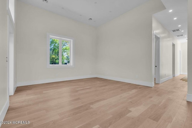 unfurnished room featuring light wood-type flooring