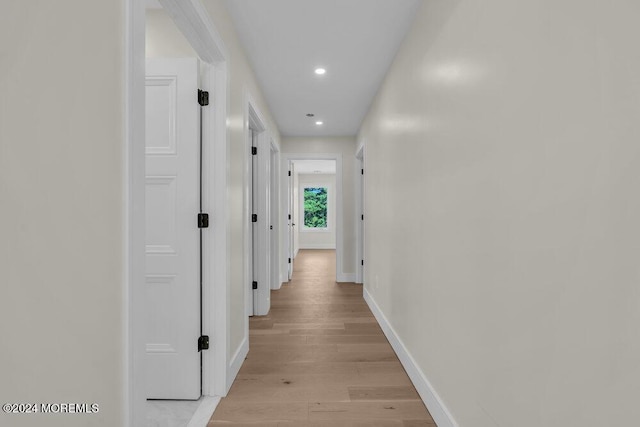 hallway featuring light wood-type flooring