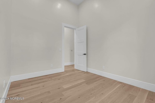 empty room with light hardwood / wood-style floors