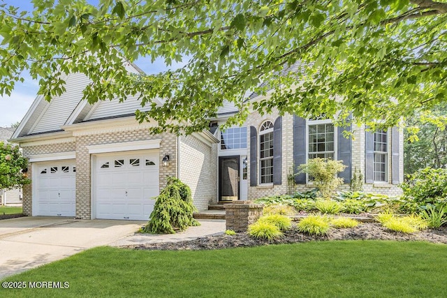 7 Muirfield Rd, Jackson, NJ 08527 - view of front of home with driveway, brick siding, a front yard, and an attached garage