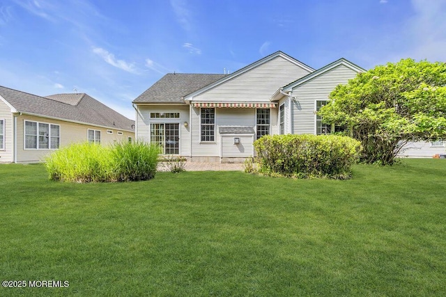 7 Muirfield Rd, Jackson, NJ 08527 - rear view of property featuring a yard