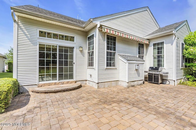 7 Muirfield Rd, Jackson, NJ 08527 - rear view of property with a patio and roof with shingles
