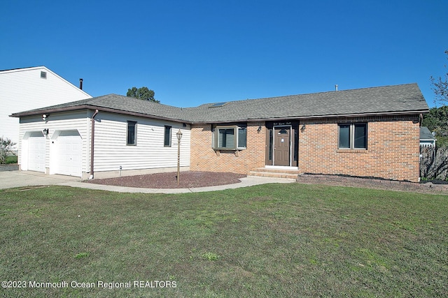 single story home with a front lawn and a garage