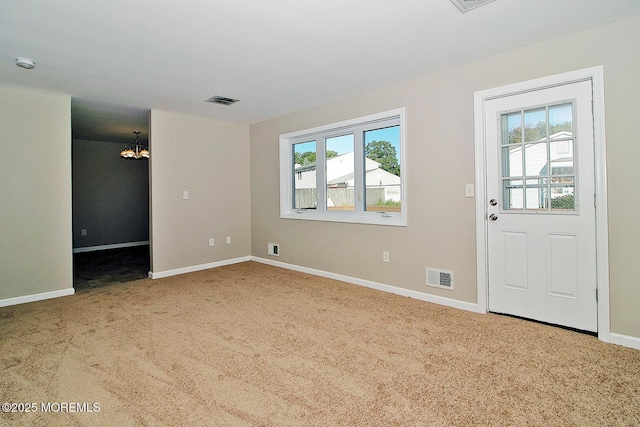 interior space with a wealth of natural light, visible vents, and baseboards