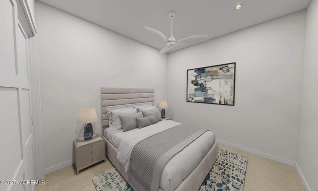 carpeted bedroom featuring ceiling fan