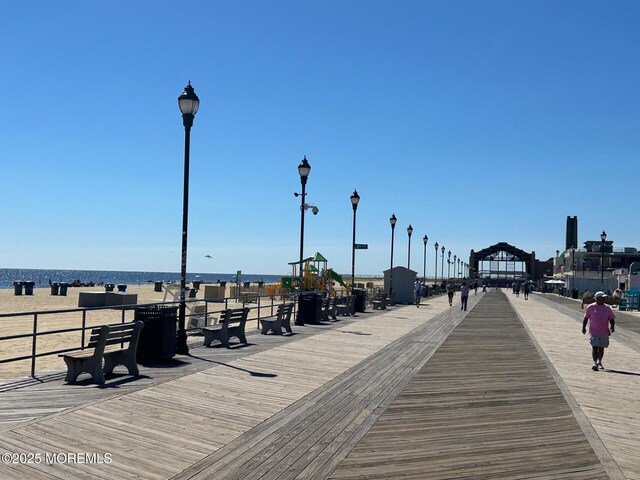 surrounding community featuring a water view