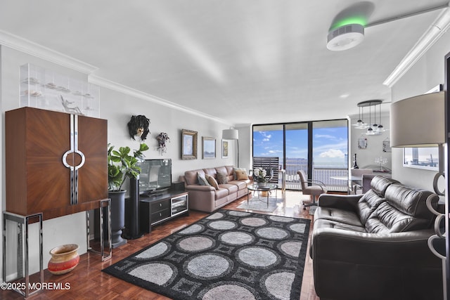 living room with a wall of windows, dark parquet flooring, and crown molding