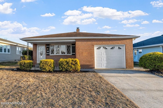 ranch-style house featuring a garage