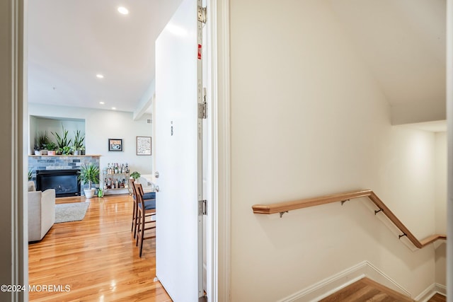 stairs with wood-type flooring