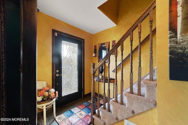 foyer featuring tile patterned floors