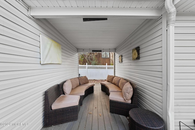 wooden deck featuring an outdoor hangout area