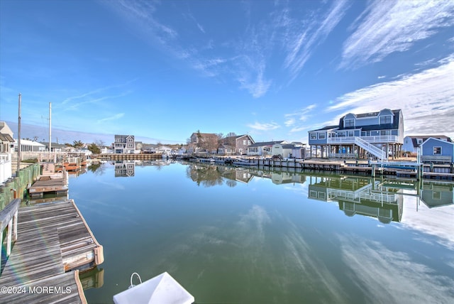 dock area with a water view