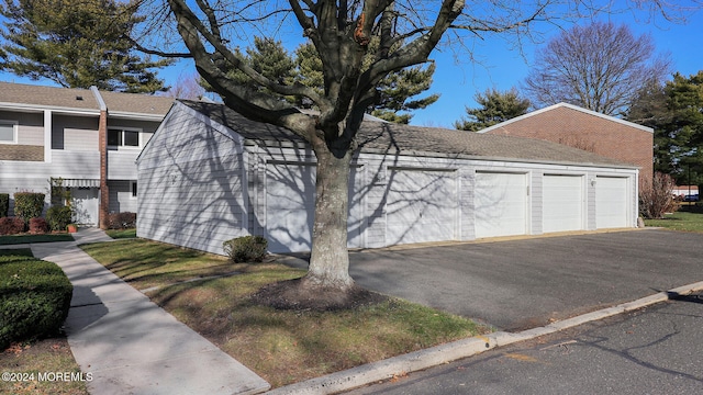 exterior space with a garage