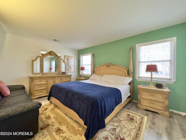 bedroom featuring light wood-type flooring