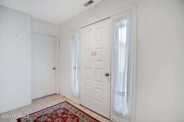 view of tiled entrance foyer