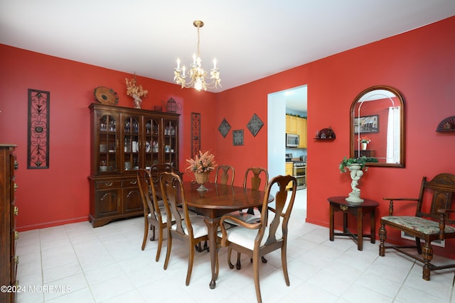 dining room featuring a chandelier