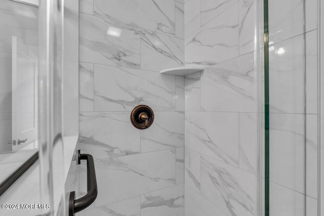 details featuring a tile shower