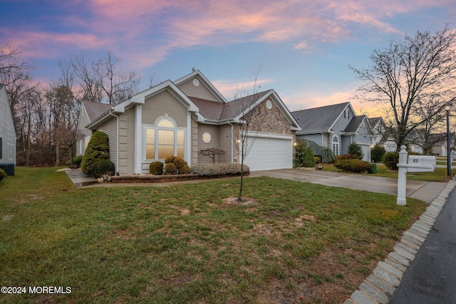 43 Spyglass Dr, Jackson, NJ 08527 - view of front of property with driveway, a garage, and a front lawn