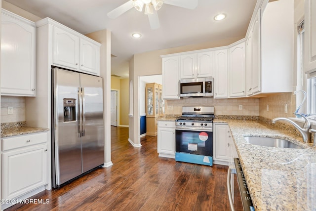 43 Spyglass Dr, Jackson, NJ 08527 - kitchen featuring appliances with stainless steel finishes, ceiling fan, white cabinets, dark wood finished floors, and recessed lighting