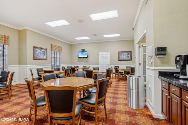 43 Spyglass Dr, Jackson, NJ 08527 - carpeted dining space with crown molding, wainscoting, and a decorative wall