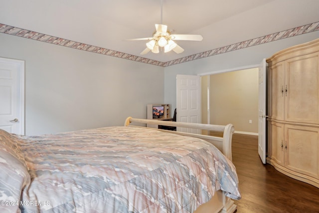 bedroom with hardwood / wood-style flooring and ceiling fan