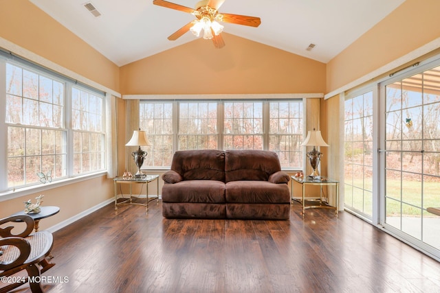 sunroom with ceiling fan and lofted ceiling