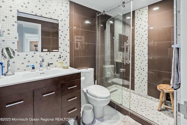 bathroom with decorative backsplash, toilet, a shower with door, and tile walls