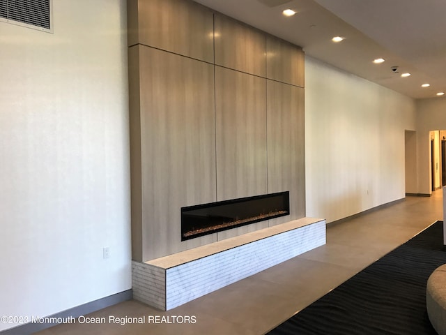 unfurnished living room with a fireplace