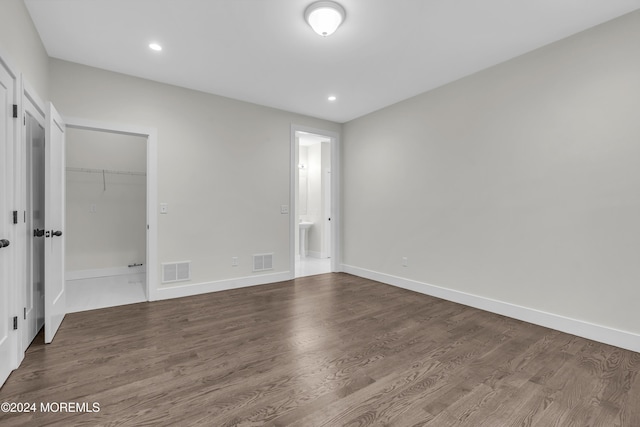 unfurnished room featuring hardwood / wood-style floors